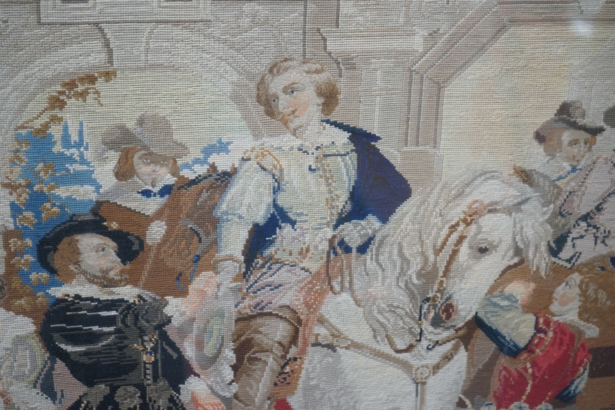 A 19th century Berlin tapestry panel in cubed parquetry and gilt gesso frame, width 146cm, height 120cm